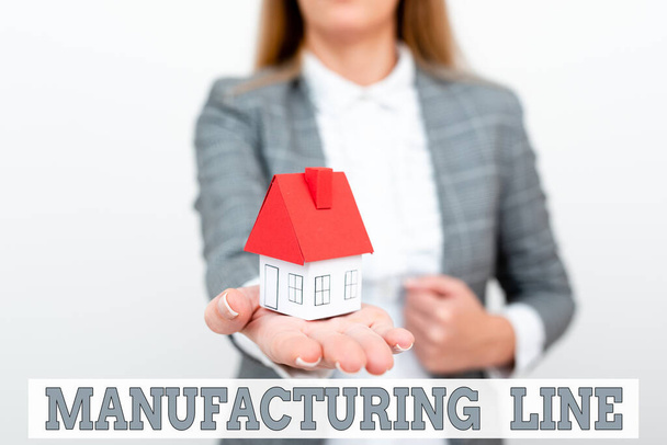 Text showing inspiration Manufacturing Line. Word Written on set of sequential operations established in a factory A Young Lady Orbusinesswoman Holding Orpresenting Home In Business Outfit - Photo, image