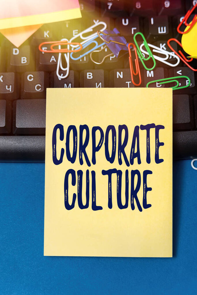 Text showing inspiration Corporate Culture. Business overview beliefs and attitudes that characterize a company Multiple Assorted Collection Office Stationery Photo Placed Over Table - Photo, image