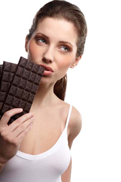 portrait of beautiful woman with a chocolate - 写真・画像