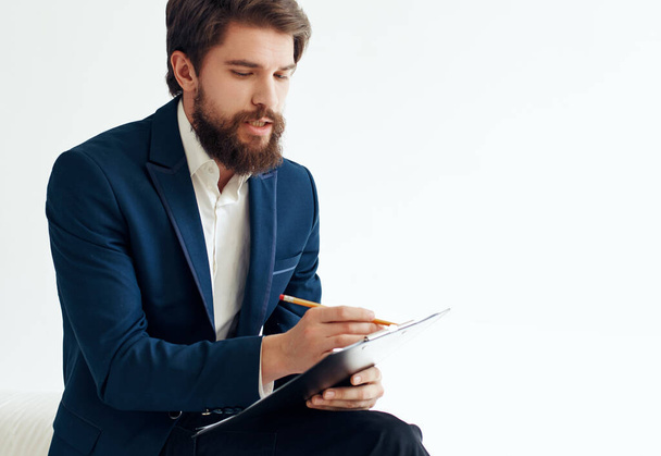 bearded business man in suit resume paperwork - Photo, Image