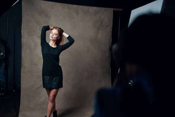 woman posing for photographer studio professional - Фото, изображение