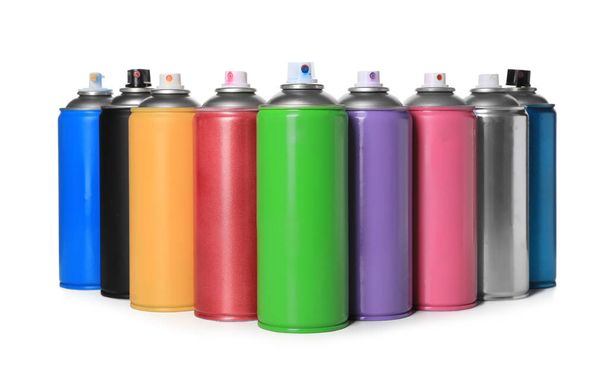 Cans of different spray paints on white background. Graffiti supplies - Valokuva, kuva