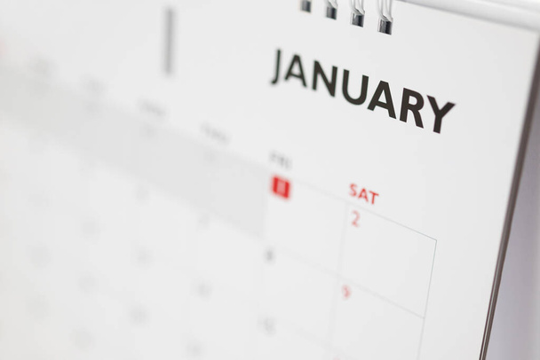 Página del calendario de enero con meses y fechas concepto de reunión de planificación de negocios - Foto, Imagen