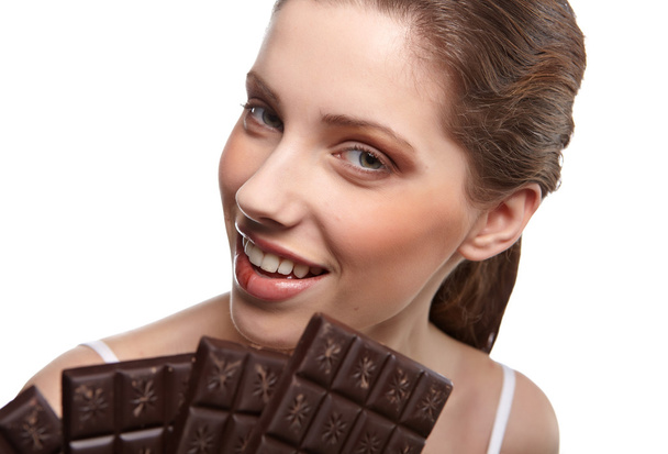 Portrait of beautiful woman with a chocolate - Foto, imagen