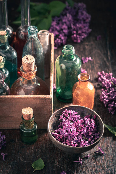 Special bio lilac aroma oil. Blooming lilac scent. Homemade Products of flowers. - Foto, immagini