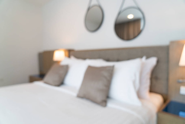 Абстрактно размыть красивый интерьер роскошной спальни отеля для фона - Фото, изображение
