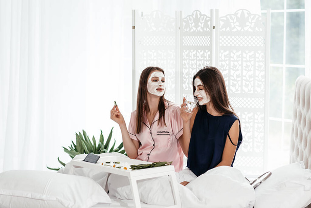 attractive womans doing beauty treatment and relaxing at home. Morning skin care beauty routine, self care. Home spa. Beauty skincare concept. - Photo, Image