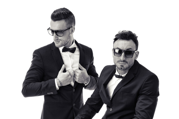 Two elegant men in suit and bowtie isolated  - Foto, afbeelding