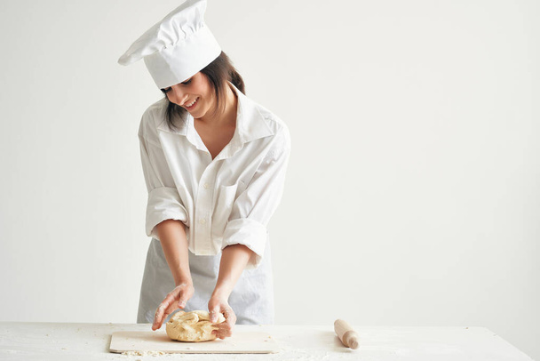 woman baker in chef uniform cooking food kitchen flour products - Photo, image
