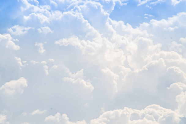 Beautiful white fluffys clouds sky background with blue sky background for copyspace - Zdjęcie, obraz