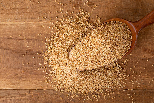 sesame seed in wooden spoon - Photo, Image
