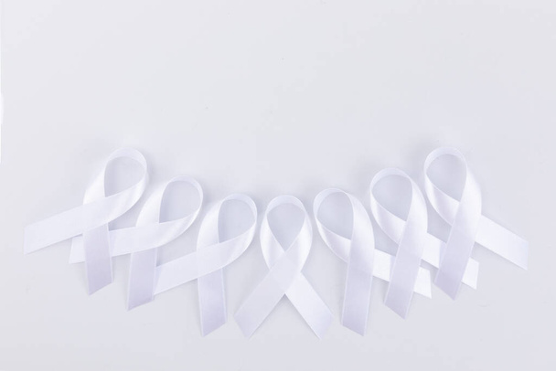 White ribbons on white background - Foto, Imagem