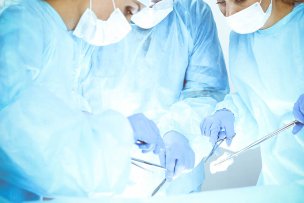 A group of surgeons is operating at the hospital. Health care concept - Foto, immagini