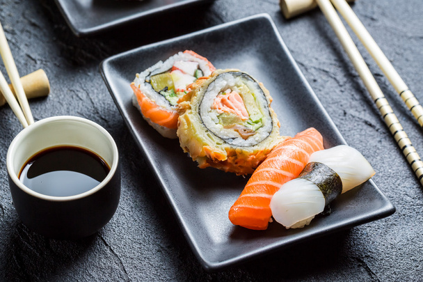 Close up of fresh sushi with soy sauce - Φωτογραφία, εικόνα