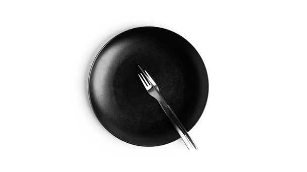 Jelbeszéd az evőeszközökkel. Egy tányér evőeszközökkel elszigetelve, fehér háttérrel. Lap, kés, villa fehér alapon. - Fotó, kép
