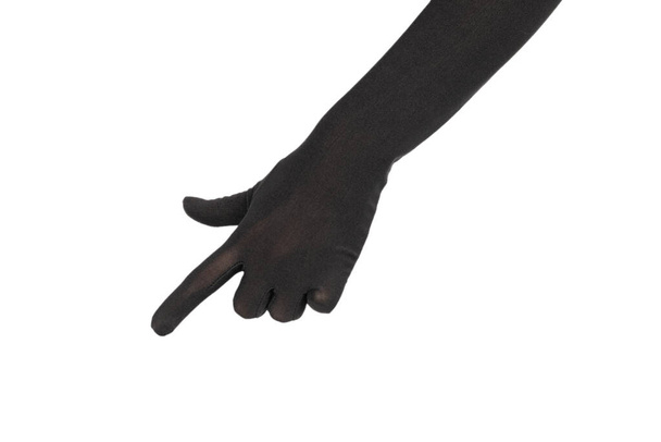 Woman in long black gloves pointing on something isolated on a white background - Photo, Image