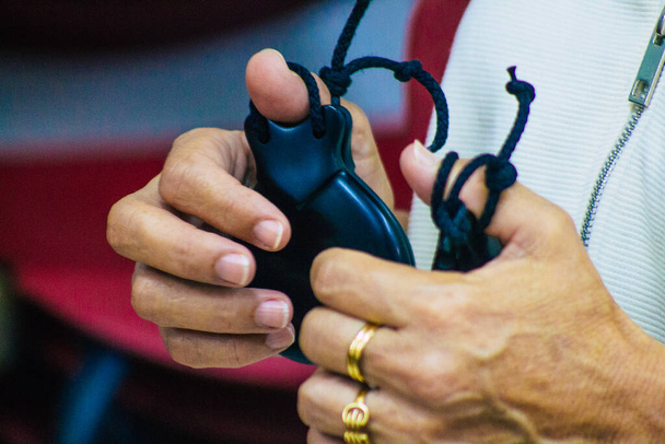 Seville Spain July 23, 2021 Closeup of the hands of castanets players, favorite musical instrument of flamenco dancers in Spain, gives rhythm and accompanies singing - Photo, Image