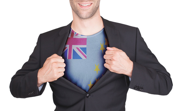 Businessman opening suit to reveal shirt with flag - Photo, Image