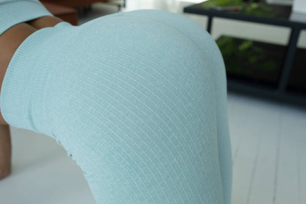 close up of buttocks fitness woman in sportswear. Home fitness workout.  - Photo, Image