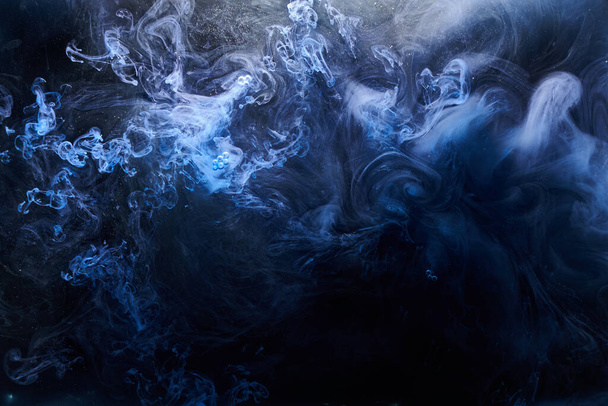 Abstract blue ocean background. Underwater swirling smoke, vibrant sea colors wallpaper, wave paint in water - Photo, Image