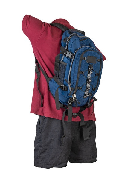 denim blue backpack,black sports shorts,dark red shirt with a collar with buttons isolated on white foane. clothes for every day - Fotografie, Obrázek
