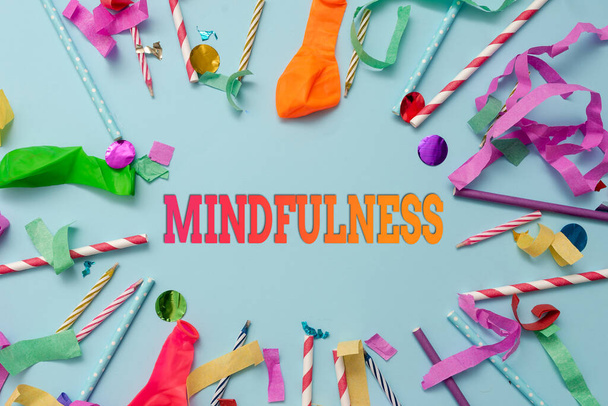 Text caption presenting Mindfulness. Business concept state of mind attained by concentrating one s is attention Colorful Party Collections Flashy Celebration Stuff Birthday Festival Kit - Photo, Image