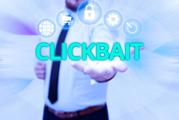 Sign displaying Clickbait. Word Written on the main purpose is to attract attention to a particular web page Gentelman Uniform Standing Holding New Futuristic Technologies. - Photo, Image