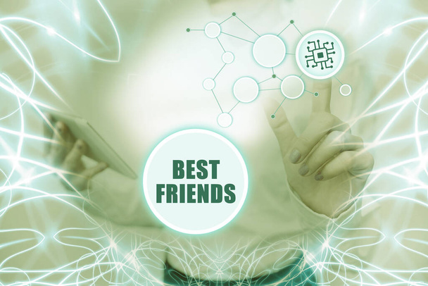 Conceptual display Best Friends. Concept meaning A person you value above other persons Forever buddies Lady Holding Tablet Pressing On Virtual Button Showing Futuristic Tech. - Photo, Image