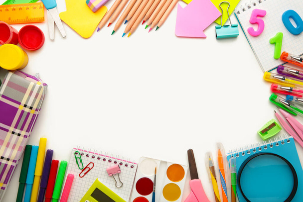 School supplies isolated on white background. Back to school concept. Top view. - 写真・画像