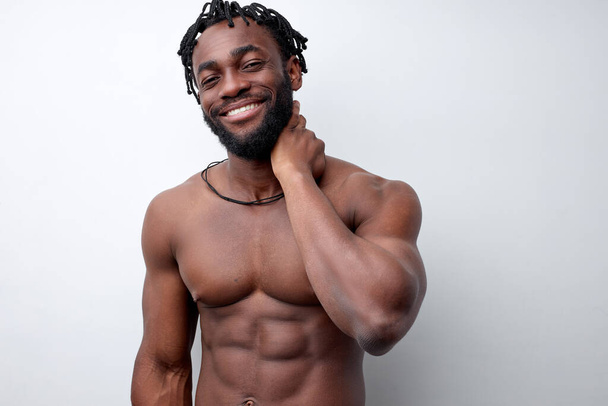 attractive afro american shirtless guy enjoy spring free time weekend isolated - Foto, Imagen