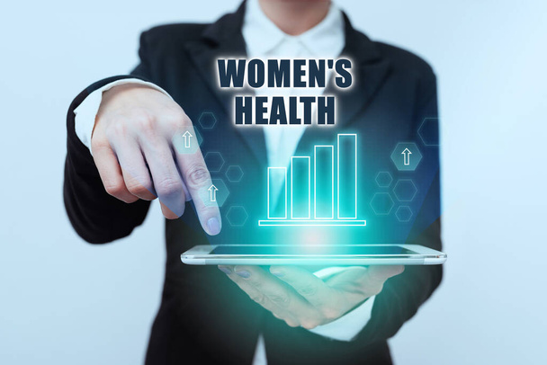 Rukopis Women S Health. Slovo pro ženy je fyzický zdravotní důsledek vyhnout se nemoci Lady v obleku ukazující na tablet ukazující futuristické grafické rozhraní. - Fotografie, Obrázek