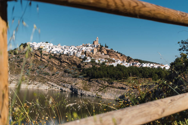 Panoramic of Iznajar town framed on wood, Andalusia - Φωτογραφία, εικόνα