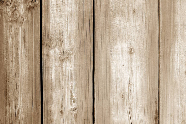 Wall made of uncutted weathered wood boards in brown color. Abstract background and texture for design. - Φωτογραφία, εικόνα