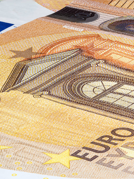 50ユーロ紙幣のデザイン面にマクロが閉じられます。欧州連合の銀行券。お金の壁紙の背景。詳細通貨の閉鎖。ユーロ分離フラットキャプチャ,新50ユーロノート - 写真・画像