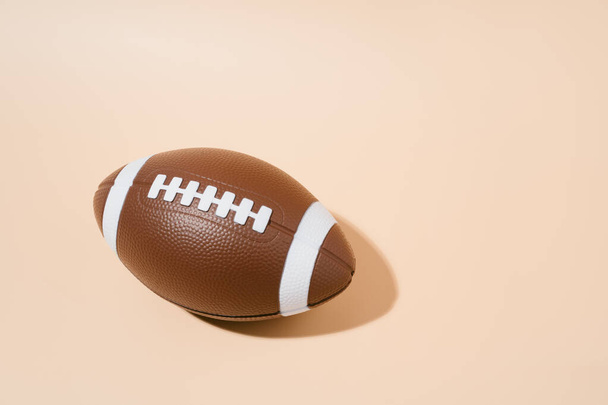 american football on brown background. sport and competition. copy space. - Foto, Bild