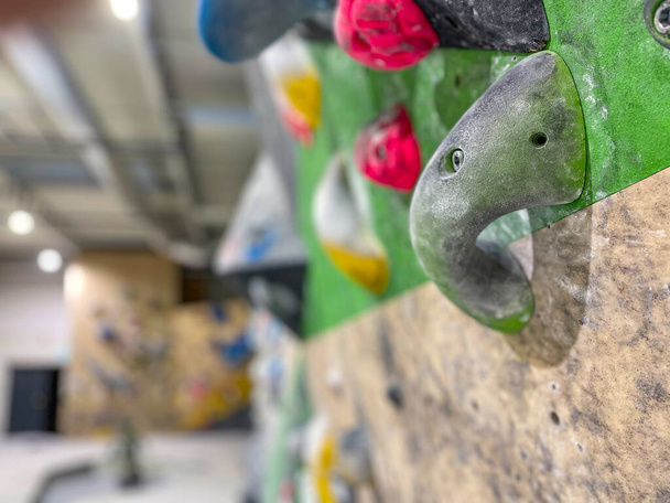 COPY SPACE: Detailed shot of artificial climbing wall at closed training center - Foto, Bild