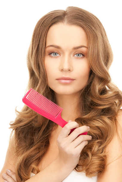 Bright picture of beautiful woman with comb - Photo, Image