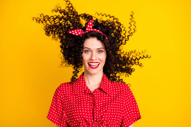 Photo of cute optimistic brunette hair lady wear red top isolated on yellow color background - Фото, зображення