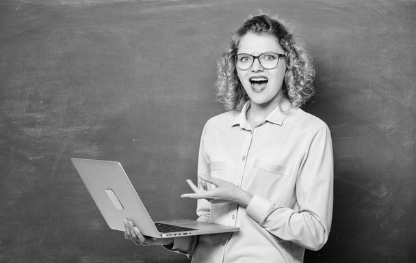success. modern technology. girl in modern school. happy student in glasses with laptop. teacher woman at blackboard. online education. business school. e-learning concept. Education via Internet - Foto, Bild