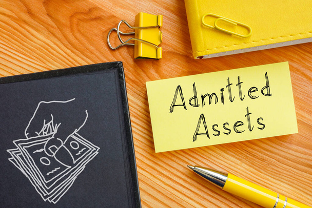 Admitted Assets are shown on a business photo using the text - Foto, afbeelding