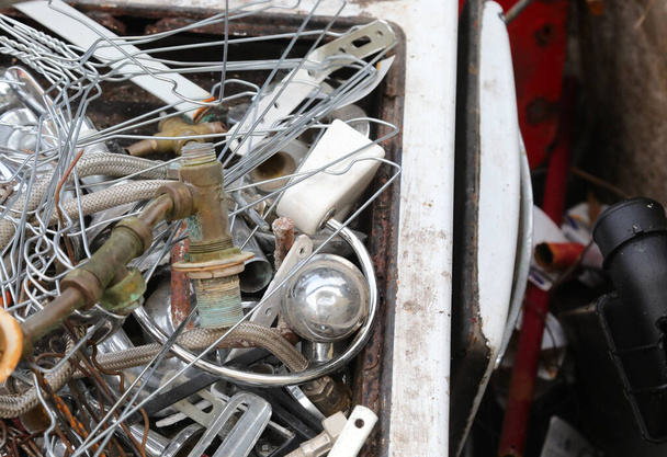 metal and ferrous material In the large recycler landfill to recover used objects and be able to recycle them in order not to pollute the environment - Photo, Image