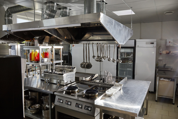 Professional kitchen in restaurant. Modern equipment and devices. Empty kitchen - Photo, Image