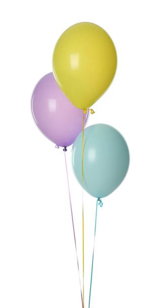 Colorful balloons with ribbons on white background - Photo, Image