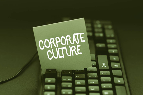 Text showing inspiration Corporate Culture. Word Written on beliefs and attitudes that characterize a company Converting Written Notes To Digital Data, Typing Important Coding Files - Photo, Image