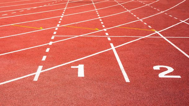 number one in red  running track on the athletic stadium - 写真・画像