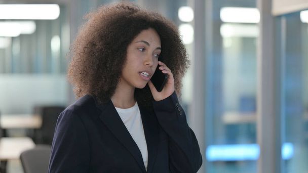 Portrait of African Businesswoman Talking on Phone - Фото, зображення