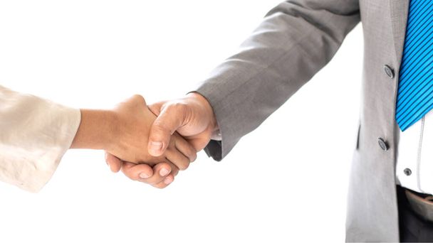 close up hand of business partnership people shake hands ending up agreement meeting showing unity on white background, business partner teamwork concept - Fotografie, Obrázek