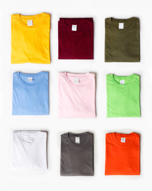 Plain t-shirt mockup template assorted colors. T-shirt isolated on a bright white background. Socks design presentation for printing. Perfect for your ad space. Space for your logo. Focus blur. - 写真・画像