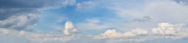 Beautiful blue cloudy sky. A panoramic composition in high resolution. Nature. - Photo, Image