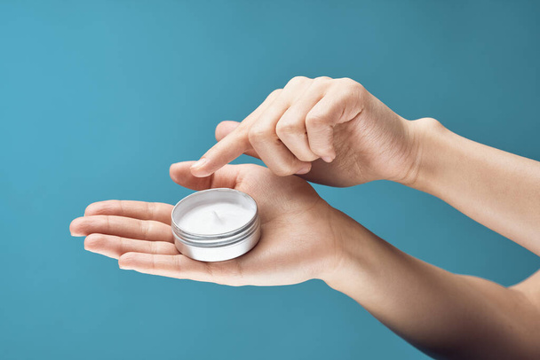 cream in hands skin care close-up dermatology health - Фото, зображення